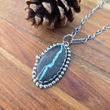Load image into Gallery viewer, Sterling and Royston Ribbon turquoise pendant on natural background
