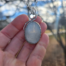 Load image into Gallery viewer, silver and white moonstone statement pendant displayed on hand
