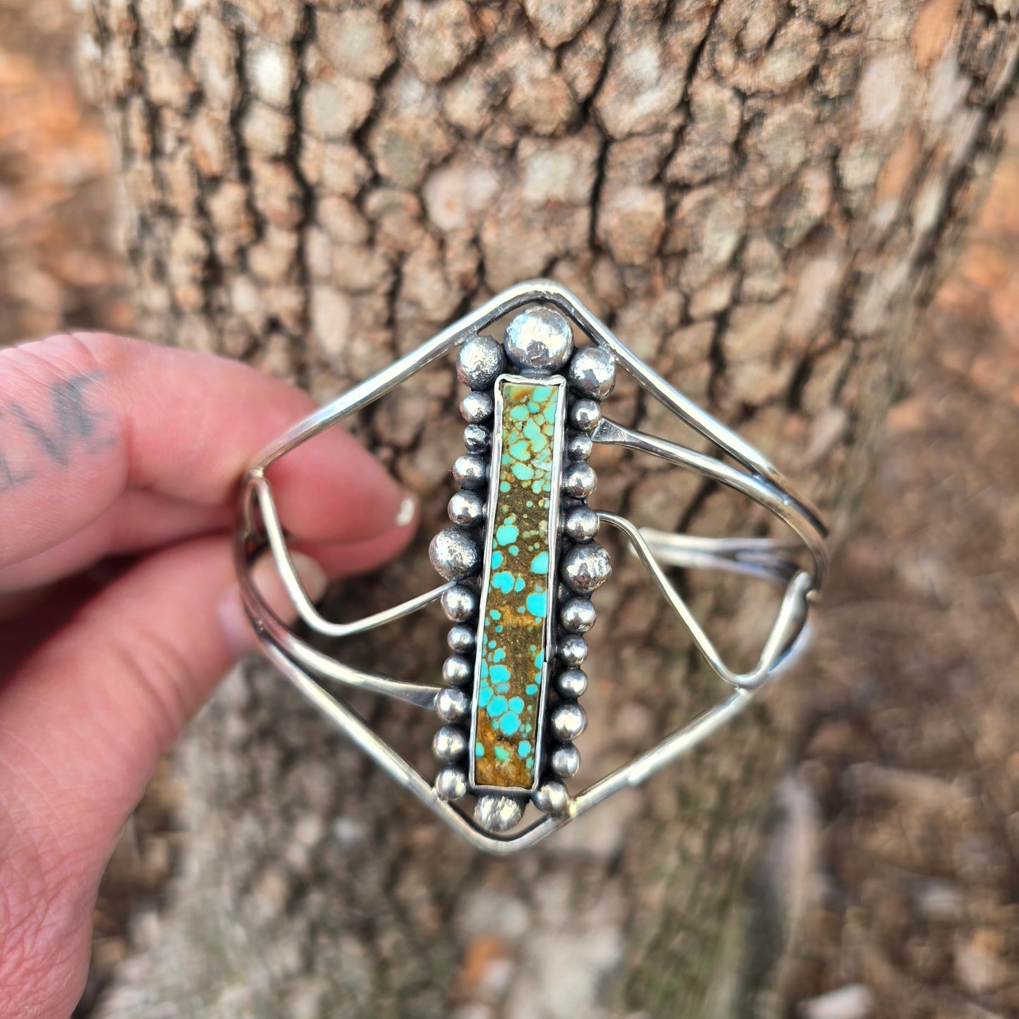 Hand-forged statement sterling silver cuff with rectangular turquoise stone