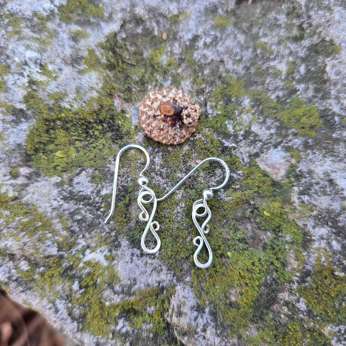 silver s curve dangle earrings