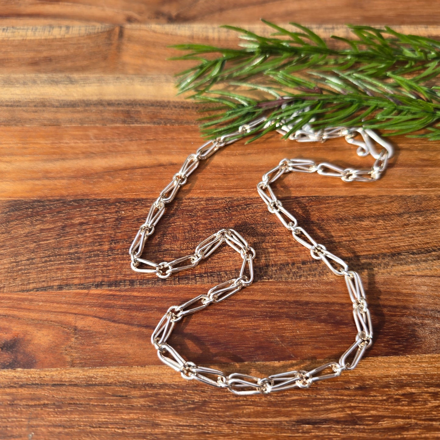 sterling silver shiny folded glory chain detailed view from top