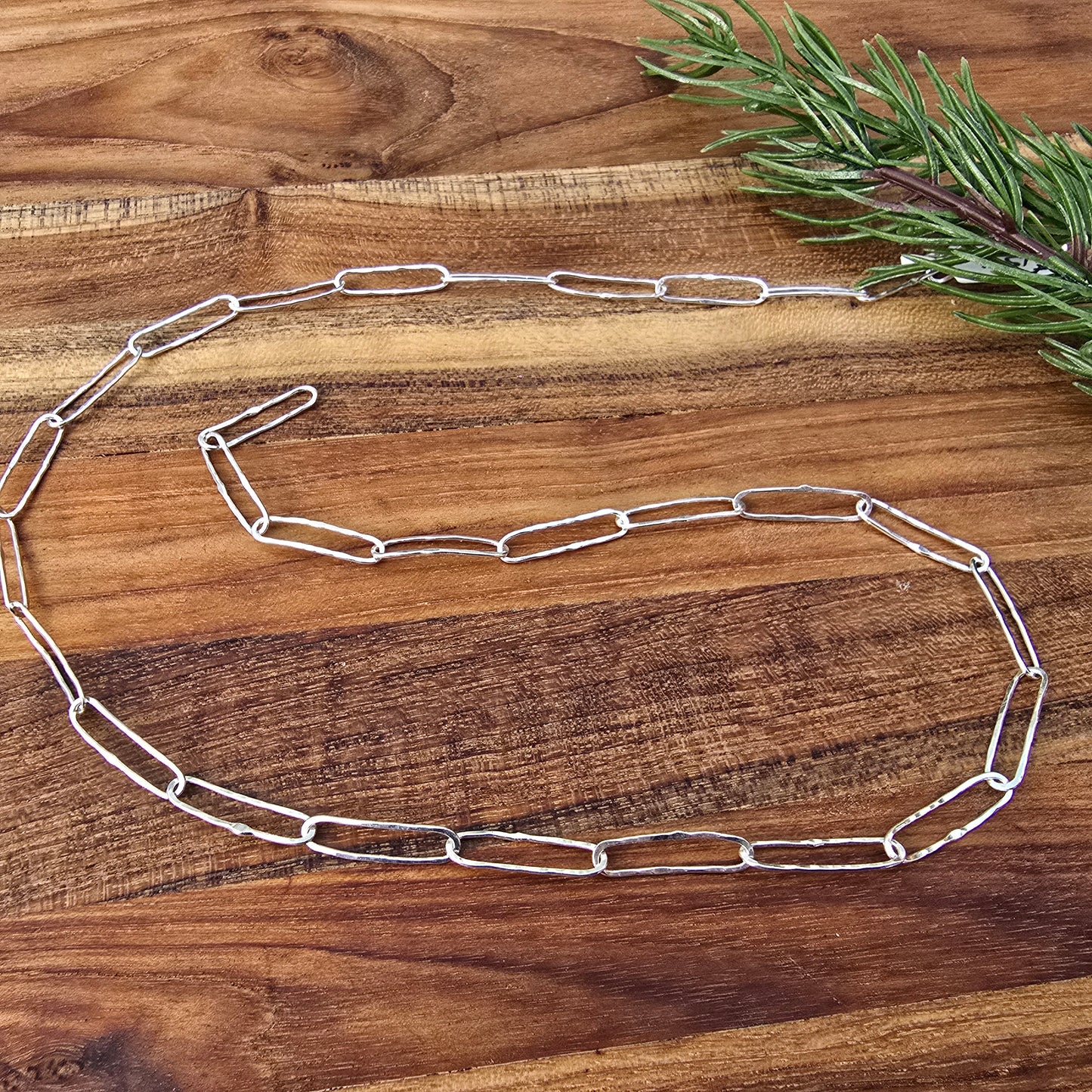 dainty sterling silver hammered paperclip link chain detailed view from top