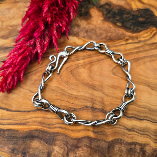 Bowtie & Twisted Link Hand-Forged Sterling Silver Bracelet
