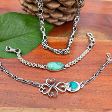 Load image into Gallery viewer, verisite chainmail bracelet, turquoise heart bracelet, and heavy men’s silver chain displayed together
