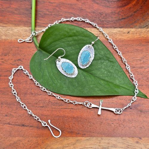 sterling silver cross choker and turquoise earring jewelry set top view