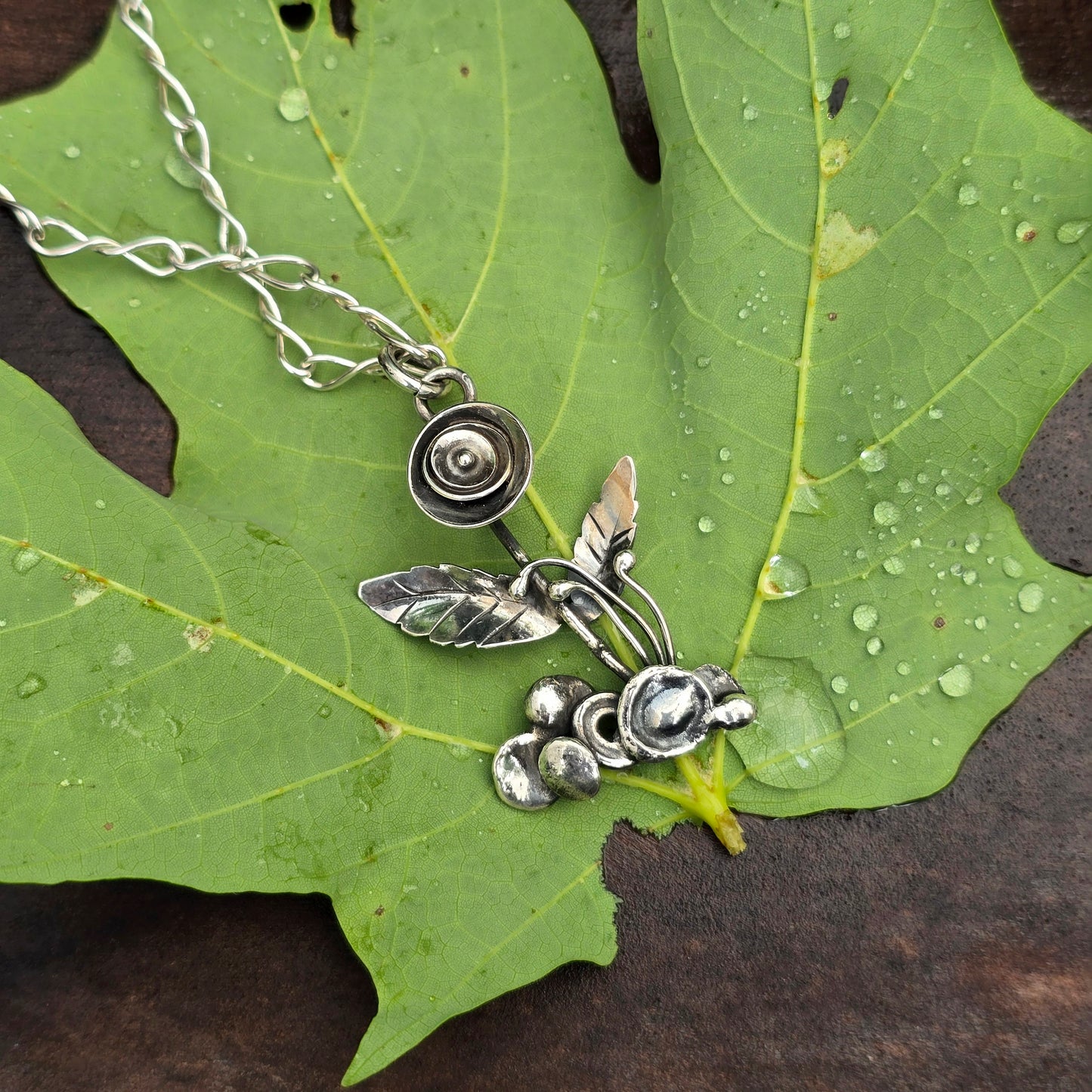 Flower in Natural Setting Hand-Forged Sterling Silver Pendant