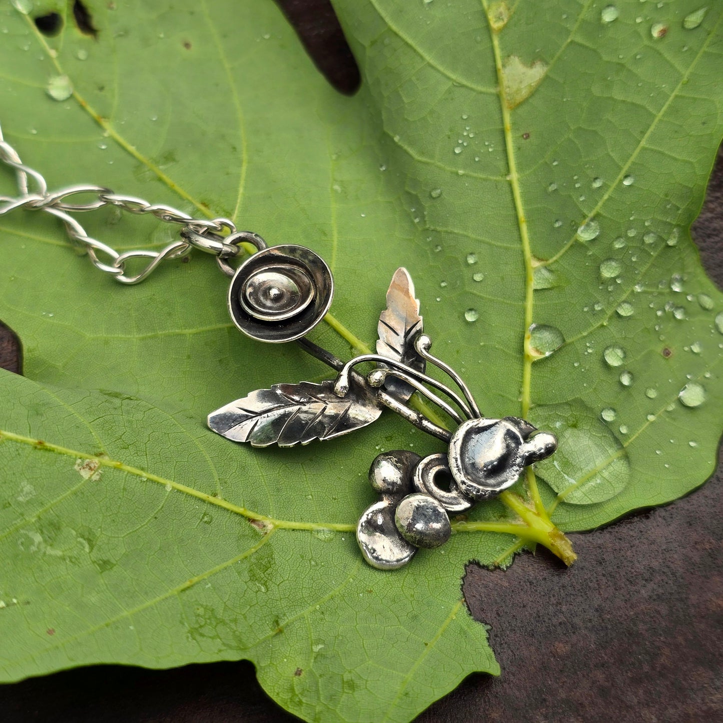 Flower in Natural Setting Hand-Forged Sterling Silver Pendant