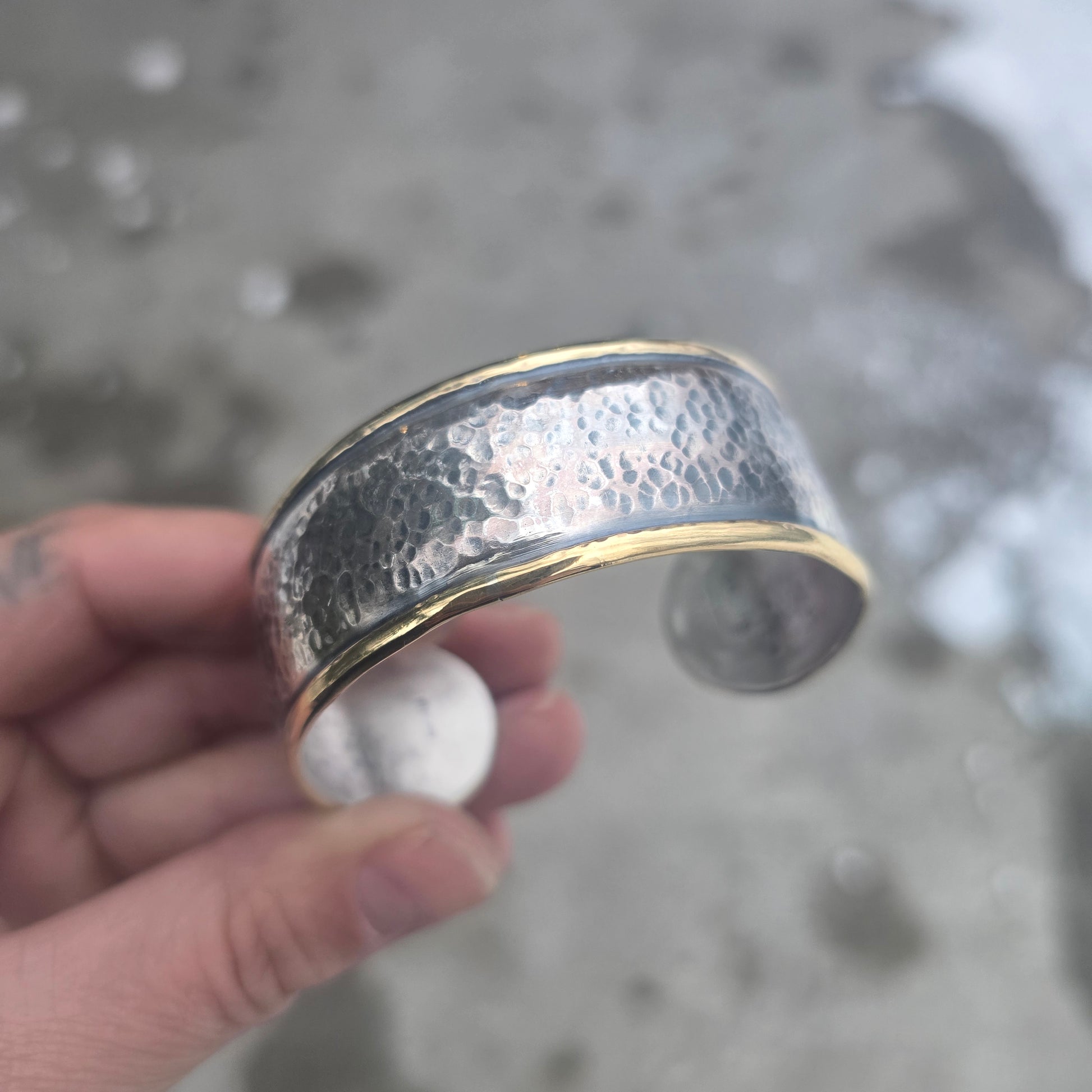 Sterling silver hammered cuff with brass perimeter