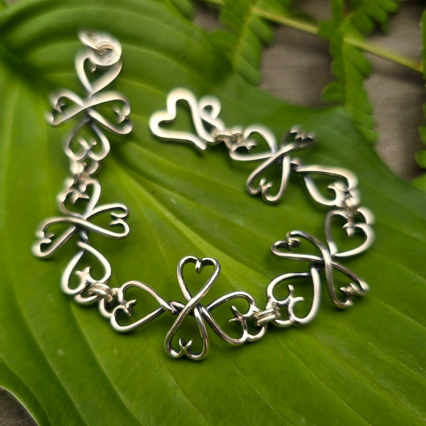 Heart Tipped Cross Sterling Silver Bracelet