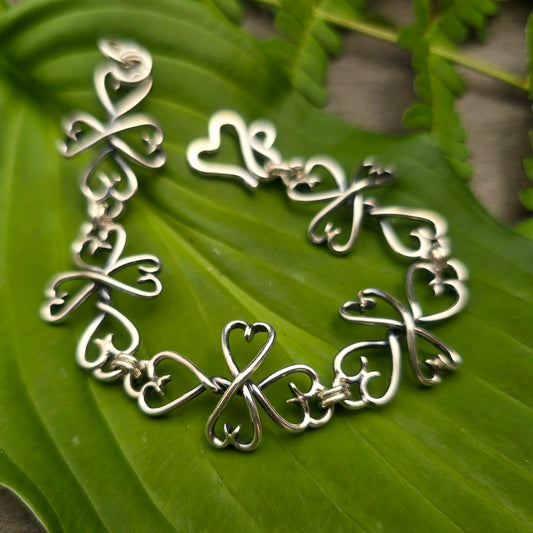Heart Tipped Cross Sterling Silver Bracelet