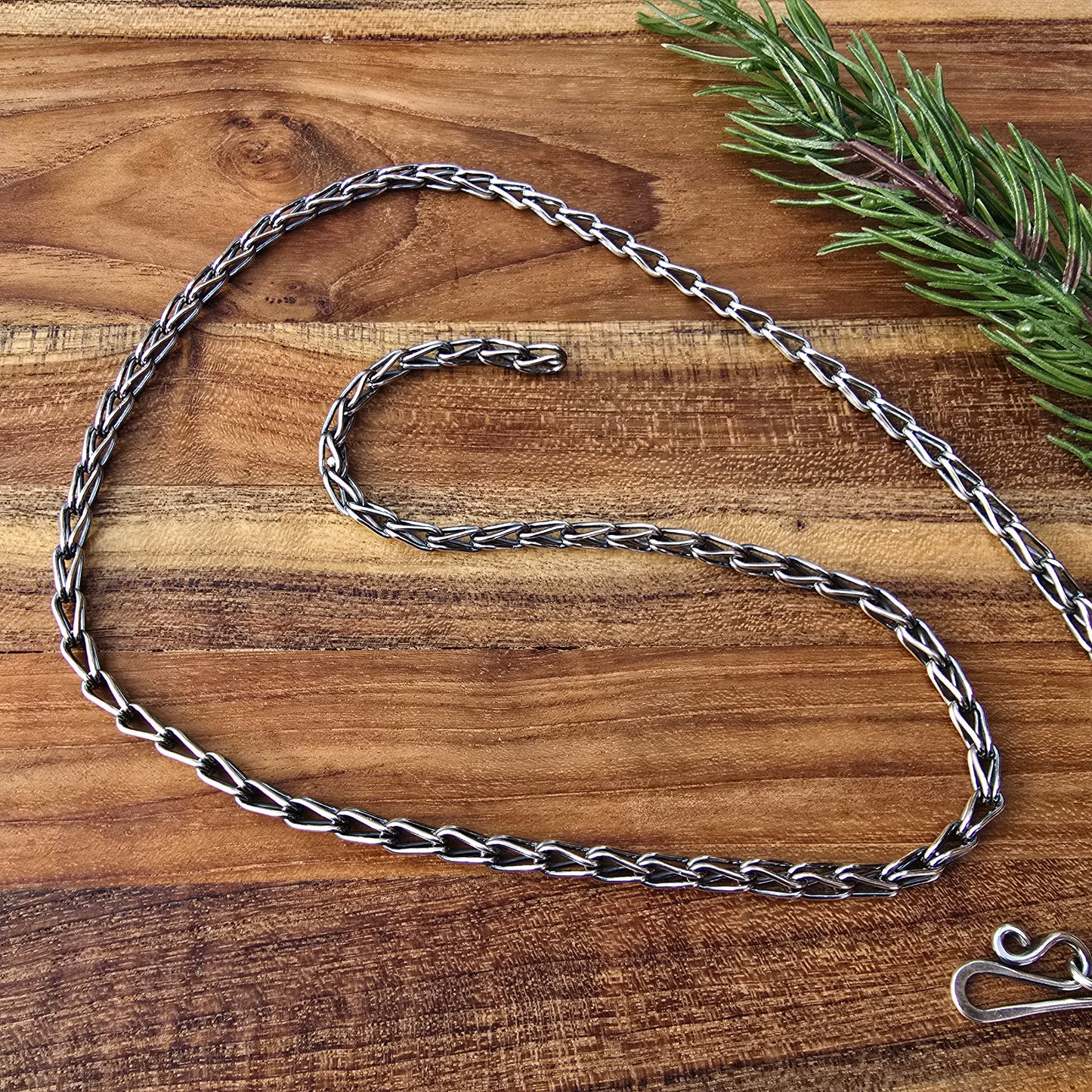 sterling silver oxidized loop in loop chain detailed view from top