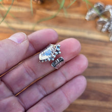 Load image into Gallery viewer, Sterling silver pearl ridge adjustable ring displayed on finger
