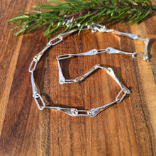 Load image into Gallery viewer, sterling silver shiny raven and paperclip link chain detailed view
