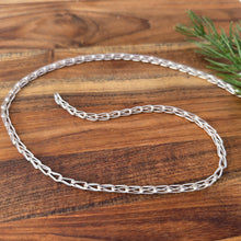 Load image into Gallery viewer, sterling silver shiny loop in loop chain detailed view from front
