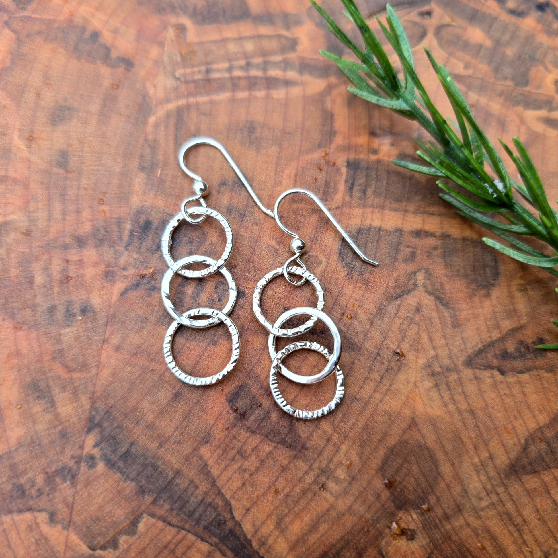 Sterling silver triple hoop textured earrings hand-forged from solid silver