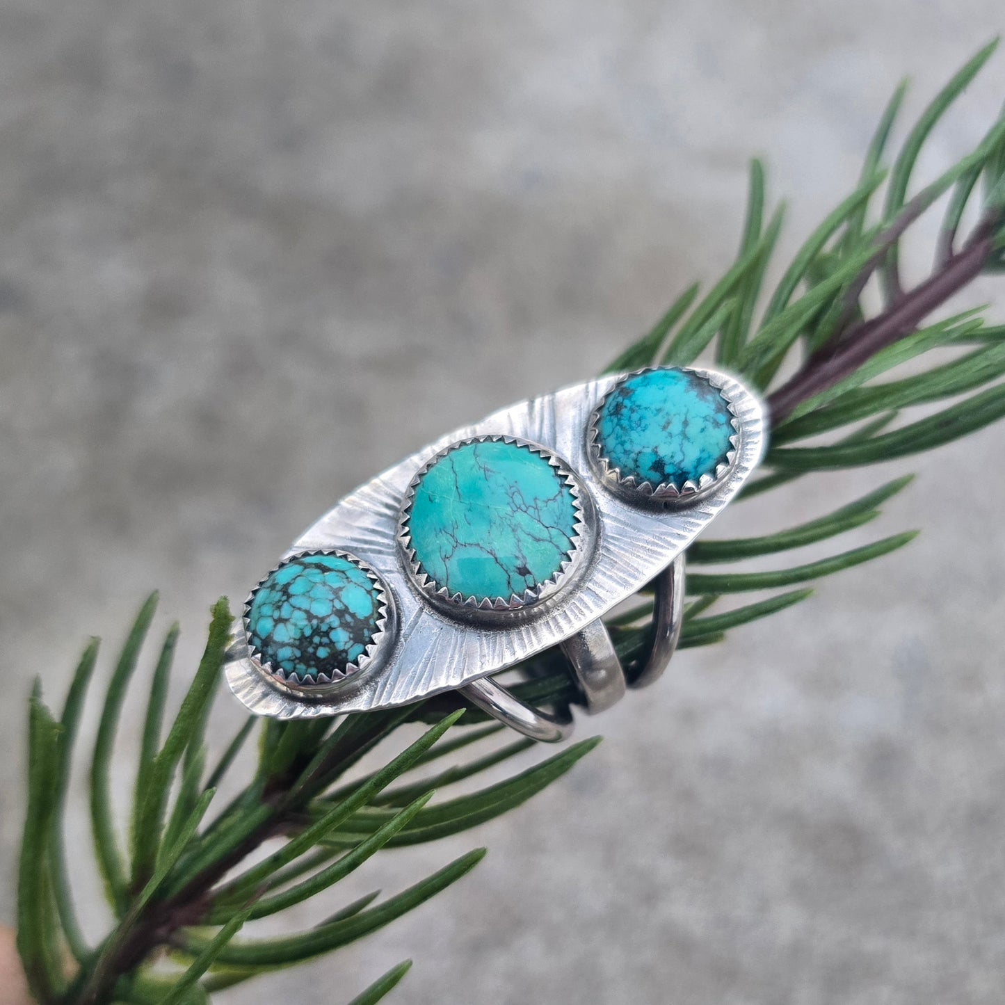 Sterling silver statement ring with three turquoise stones