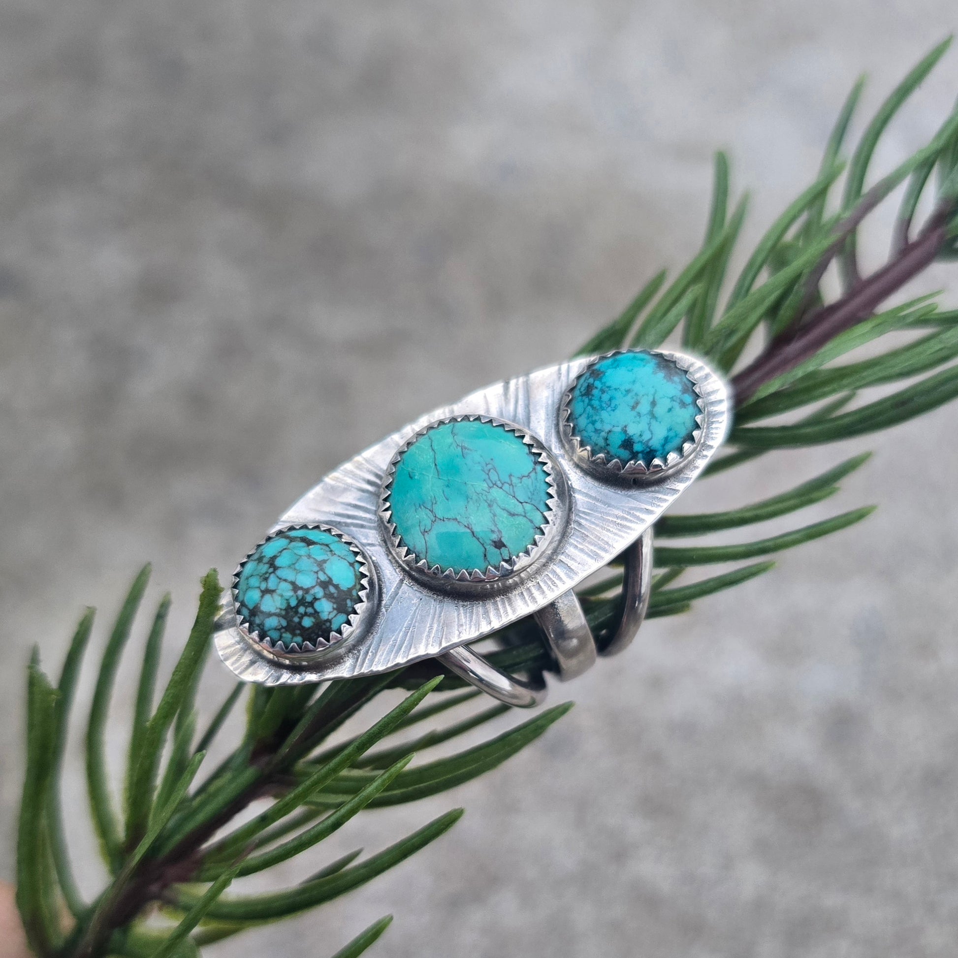 Sterling silver statement ring with three turquoise stones