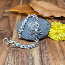 Load image into Gallery viewer, Adirondack silversmith Shane Dicob’s hand-forged sterling silver chainlink bracelet featuring a Twisted Heart Cross link.
