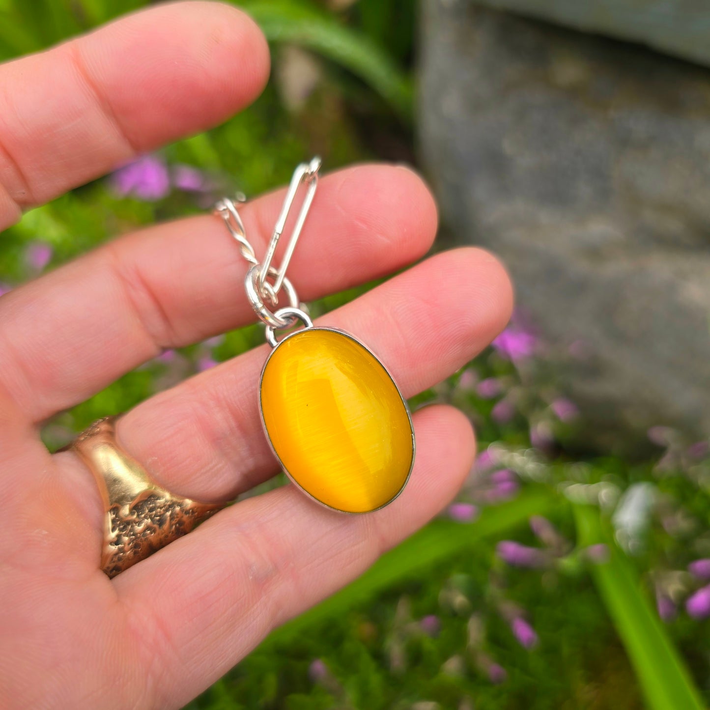 Dandelion Yellow Cat’s Eye Hand-Forged Sterling Silver Pendant