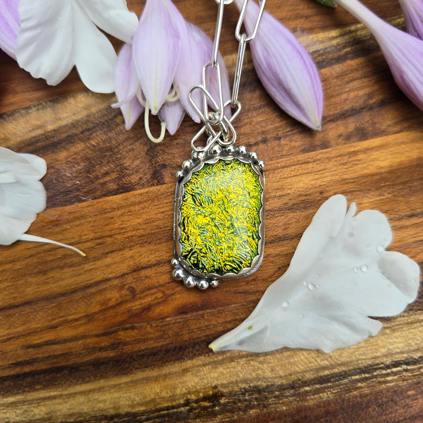 Sterling silver and yellow pedant with beads top view