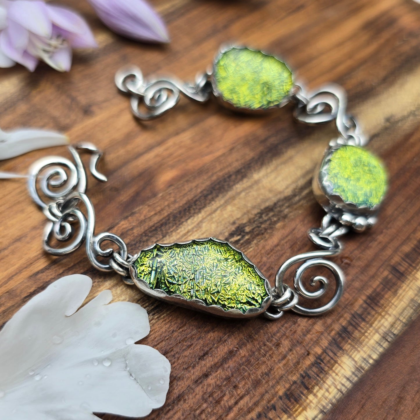 silver swirl and yellow stone bracelet