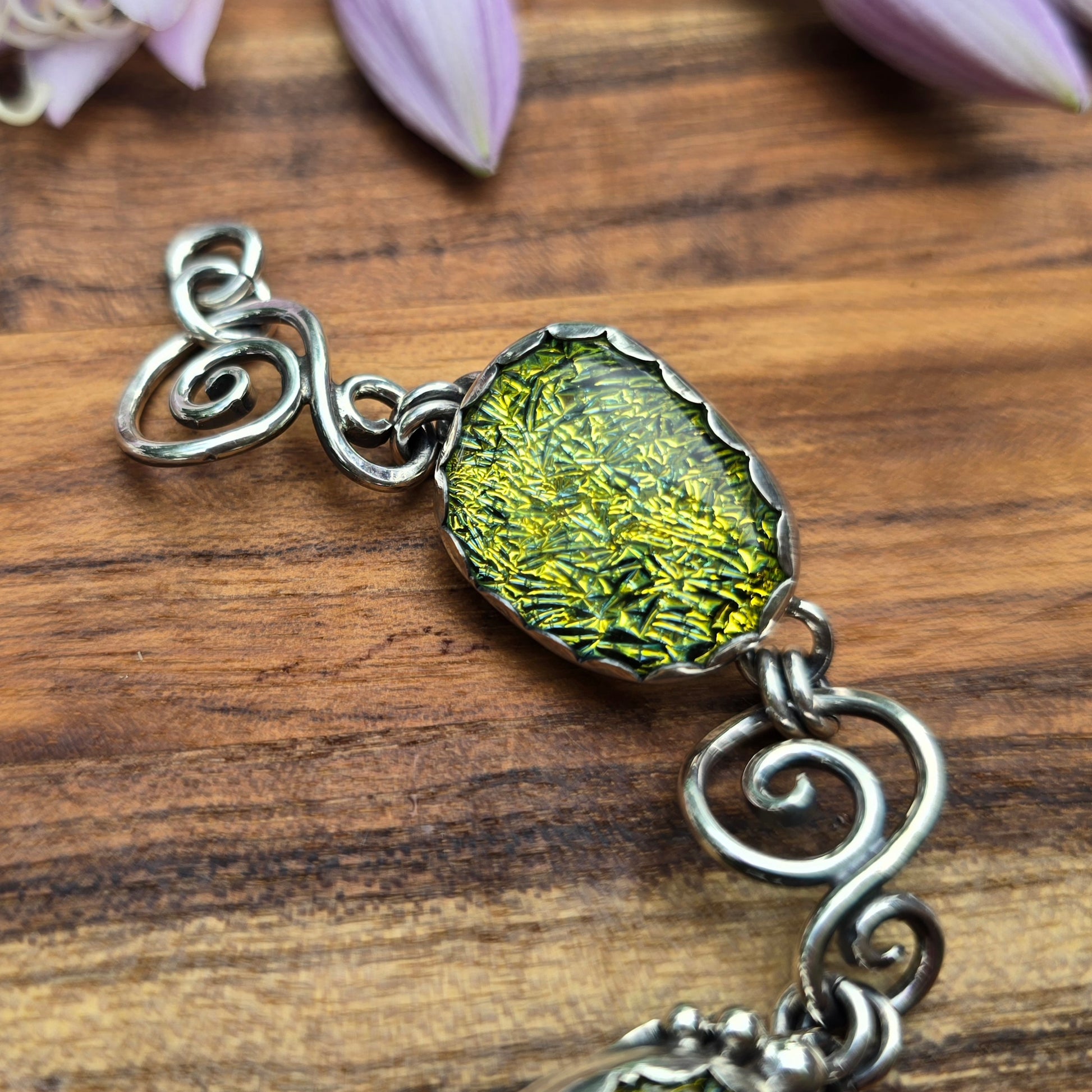 dichroic and sterling silver swirl bracelet detailed view