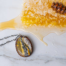 Load image into Gallery viewer, Bumblebee Jasper Pendant with Copper Honeycomb Bezel and Bee Accent
